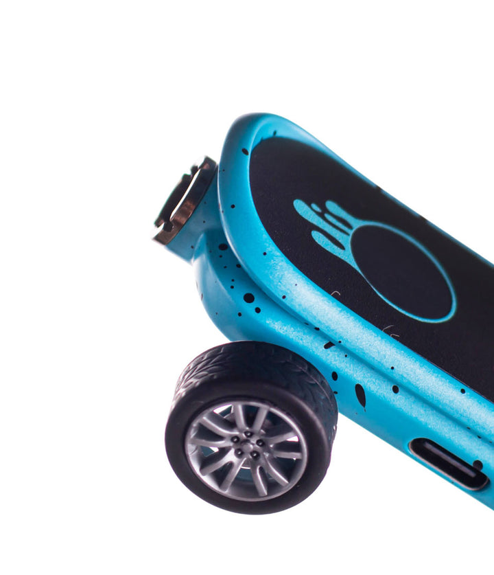 Blue Black Spatter Wulf Mods Deck Skateboard Voltage Battery Closeup View on White Background